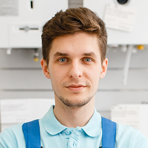 Technician working on plumbing service